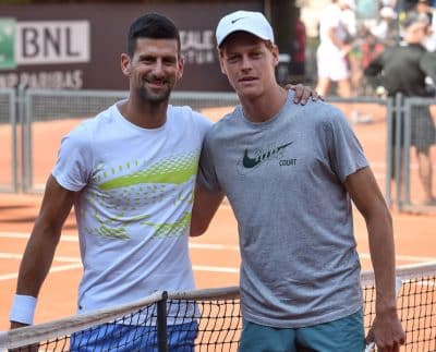 Novak Djokovic and Jannik Sinner during practice