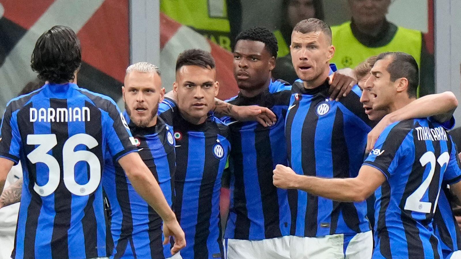 Os nerazzurri controlam a meia-final do CL com golos de Dzeko e Mkhitaryan no San Siro